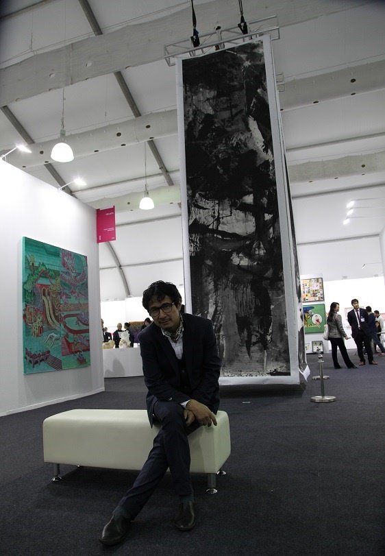 Lan Zhenghui with his monumental installation "Ink Monument" at Hong Kong Art Week's Art Central